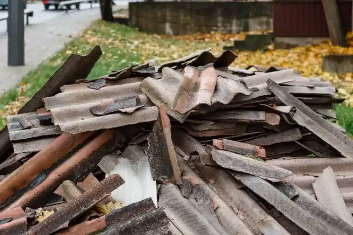 Pile of discarded roofing materials and debris, highlighting cluttered space in need of junk removal services in Hagerstown, MD.